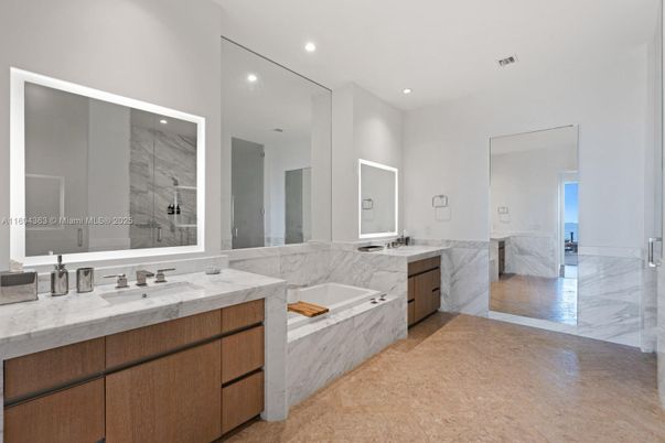 Bathroom, Dual Sink Vanities, Interior, Marble, Marble Walls, Recessed Lighting
