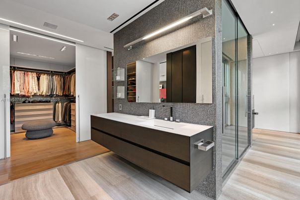 Bathroom, Dual Sink Vanities, Glass Shower, Interior, Recessed Lighting, Walk-in Closets, Wood Texture Flooring