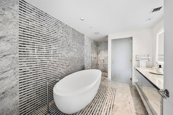 Bathroom, Free Standing Baths, Glass Shower, Interior, Marble Walls, Recessed Lighting