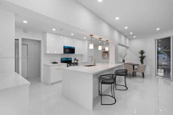 Dining room, Interior, Kitchen, Marble, Pendant Lights, Recessed Lighting, Stainless Steel Appliances