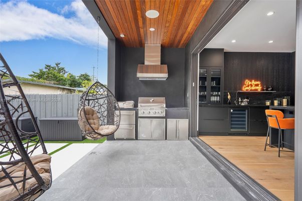 Exterior, Fireplace, Wood Texture Flooring