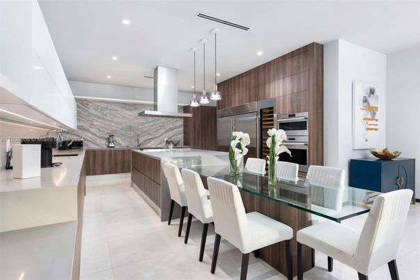 Dining room, Interior, Kitchen, Marble Walls, Pendant Lights, Recessed Lighting, Stainless Steel Appliances