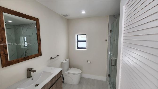 Bathroom, Glass Shower, Interior, Marble Walls, Recessed Lighting, Wood Texture Flooring