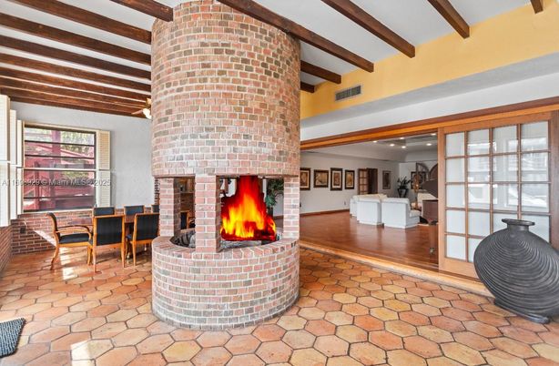 Dining room, Fireplace, Interior, Recessed Lighting, Stone Walls, Wooden Beams