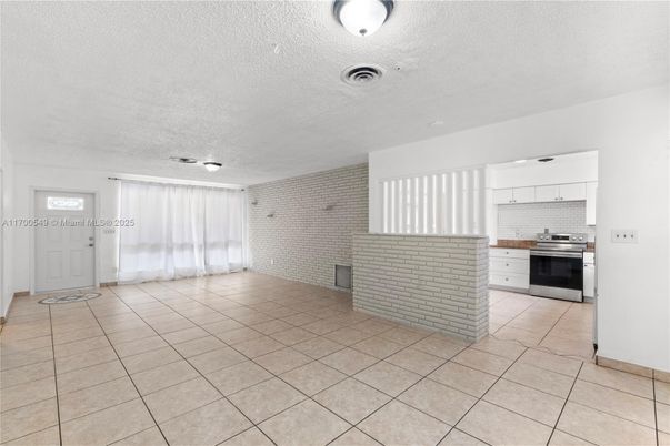 Empty room, Interior, Kitchen, Stainless Steel Appliances, Stone Walls