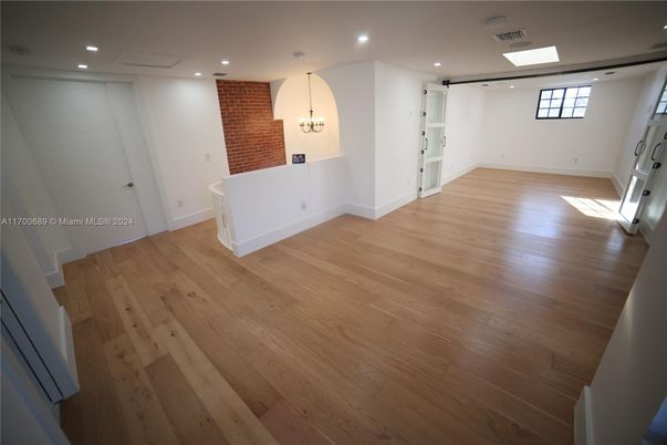 Empty room, Interior, Recessed Lighting, Stone Walls, Wood Texture Flooring