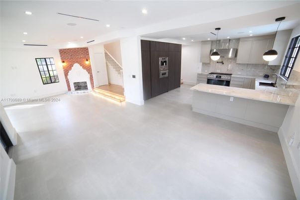 Fireplace, Interior, Kitchen, Pendant Lights, Recessed Lighting, Stone Walls