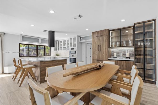 Dining room, Interior, Kitchen, Recessed Lighting, Stainless Steel Appliances, Wood Texture Flooring