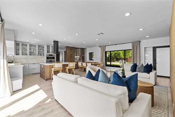 Dining room, Interior, Kitchen, Living room, Recessed Lighting, Stainless Steel Appliances, Wood Texture Flooring