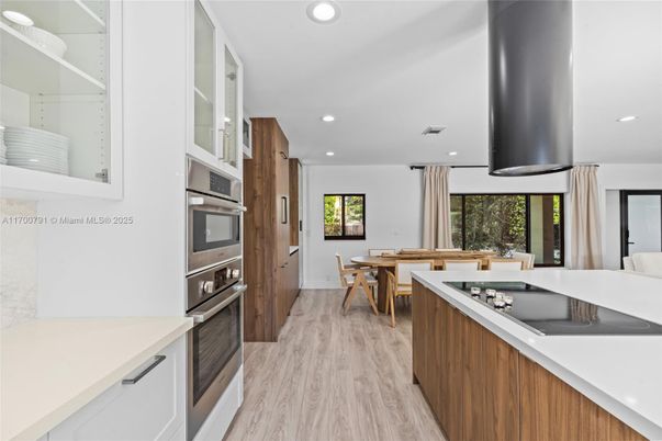 Dining room, Interior, Kitchen, Recessed Lighting, Stainless Steel Appliances, Wood Texture Flooring
