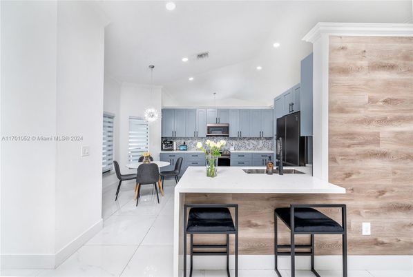 Dining room, Interior, Kitchen, Marble, Pendant Lights, Recessed Lighting, Stainless Steel Appliances