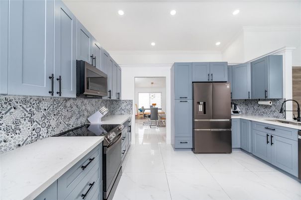 Dining room, Interior, Kitchen, Marble, Pendant Lights, Recessed Lighting, Stainless Steel Appliances