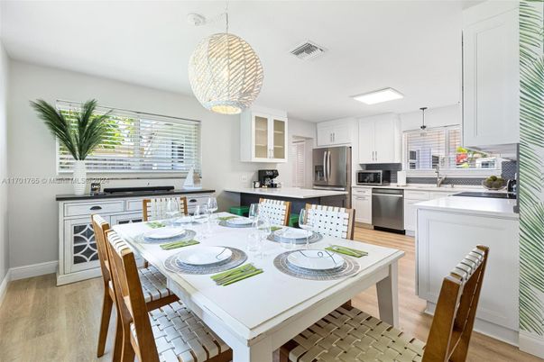 Dining room, Interior, Kitchen, Pendant Lights, Stainless Steel Appliances, Wood Texture Flooring