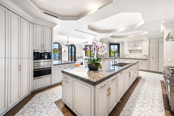 Chandelier, Interior, Kitchen, Pendant Lights, Recessed Lighting, Stainless Steel Appliances, Wood Texture Flooring