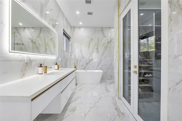 Bathroom, Dual Sink Vanities, Free Standing Baths, Glass Shower, Interior, Marble, Marble Walls, Recessed Lighting
