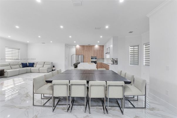 Dining room, Interior, Kitchen, Living room, Marble, Recessed Lighting, Stainless Steel Appliances