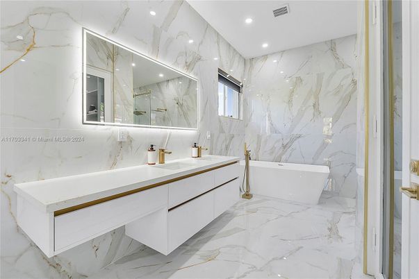 Bathroom, Dual Sink Vanities, Free Standing Baths, Interior, Marble, Marble Walls, Recessed Lighting