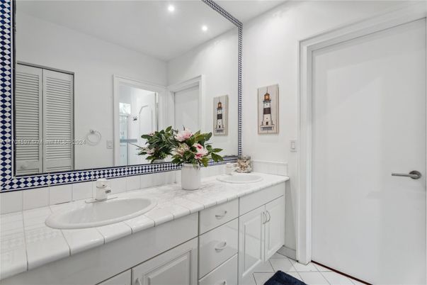 Bathroom, Dual Sink Vanities, Interior, Recessed Lighting, Tile Countertops