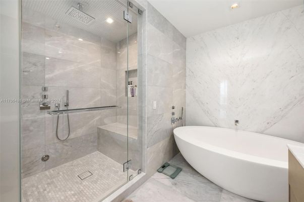Bathroom, Free Standing Baths, Glass Shower, Interior, Marble Walls, Recessed Lighting