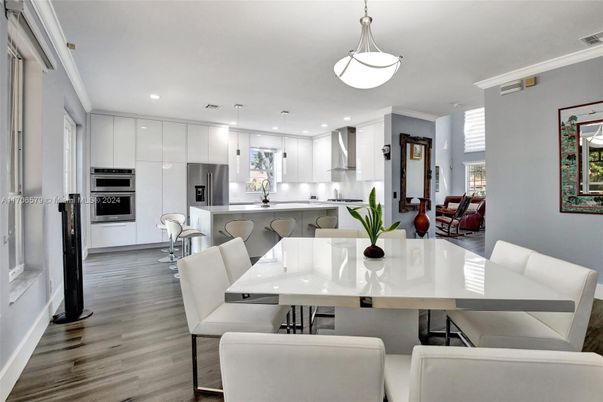 Dining room, Interior, Kitchen, Pendant Lights, Recessed Lighting, Stainless Steel Appliances, Wood Texture Flooring