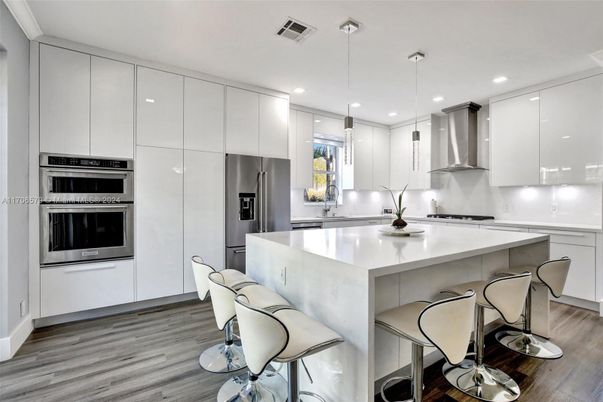 Interior, Kitchen, Pendant Lights, Recessed Lighting, Stainless Steel Appliances, Wood Texture Flooring