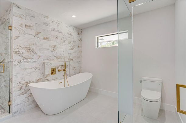 Bathroom, Free Standing Baths, Glass Shower, Interior, Marble Walls, Recessed Lighting