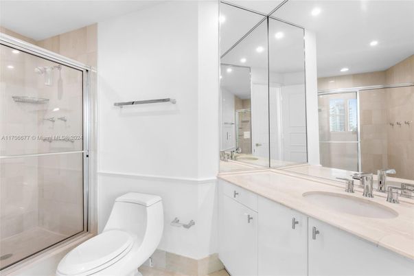 Bathroom, Dual Sink Vanities, Glass Shower, Interior, Recessed Lighting, Tile Countertops