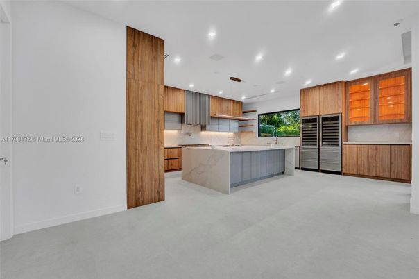 Interior, Kitchen, Marble Walls, Recessed Lighting, Stainless Steel Appliances