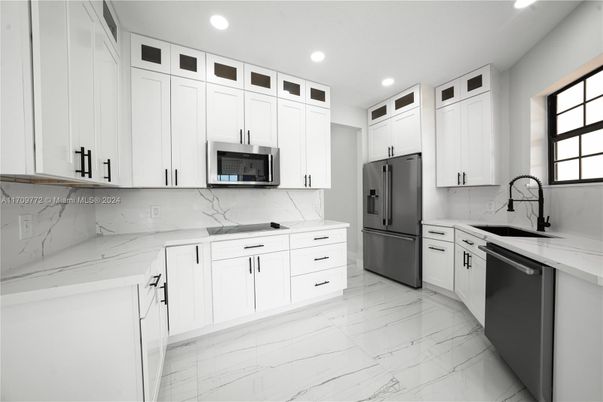Interior, Kitchen, Marble, Marble Walls, Recessed Lighting, Stainless Steel Appliances
