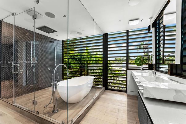 Bathroom, Dual Sink Vanities, Free Standing Baths, Glass Shower, Interior, Recessed Lighting, Wood Texture Flooring