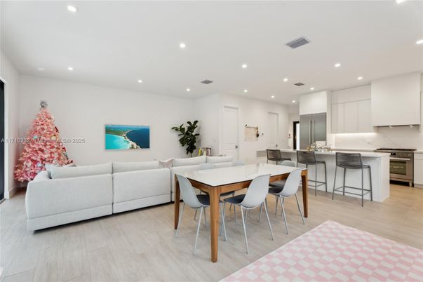 Dining room, Interior, Kitchen, Living room, Recessed Lighting, Stainless Steel Appliances, Wood Texture Flooring