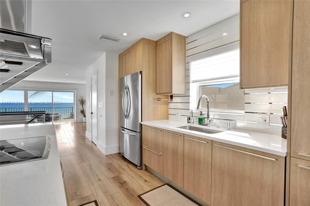 Interior, Kitchen, Recessed Lighting, Stainless Steel Appliances, Water, Wood Texture Flooring