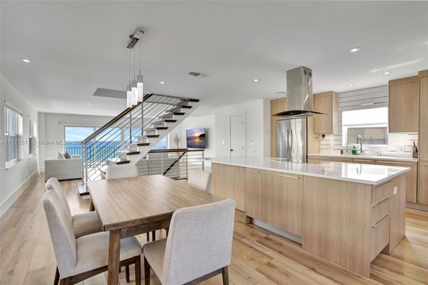 Dining room, Interior, Kitchen, Pendant Lights, Recessed Lighting, Stainless Steel Appliances, Wood Texture Flooring