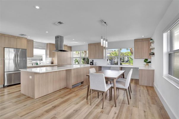 Dining room, Interior, Kitchen, Pendant Lights, Recessed Lighting, Stainless Steel Appliances, Wood Texture Flooring