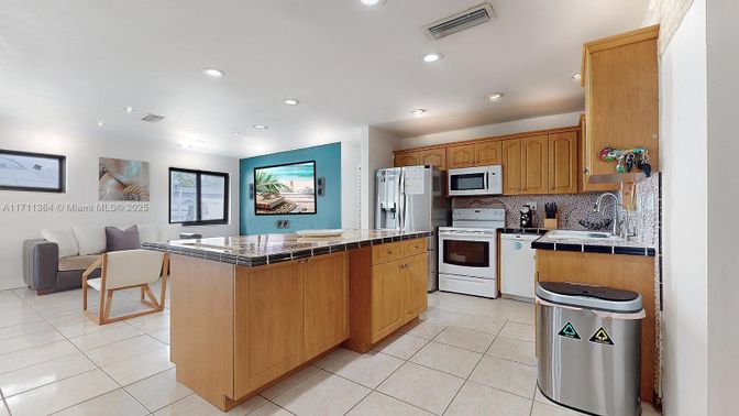 Interior, Kitchen, Recessed Lighting, Stainless Steel Appliances, Tile Countertops
