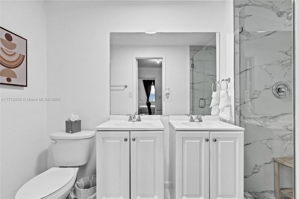 Bathroom, Dual Sink Vanities, Glass Shower, Interior, Marble Walls