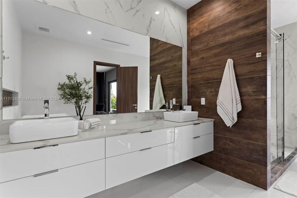 Bathroom, Dual Sink Vanities, Interior, Marble Walls, Recessed Lighting, Wooden Walls