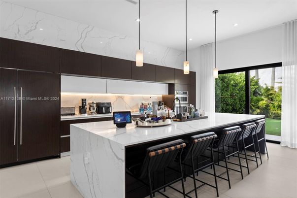 Interior, Kitchen, Marble Walls, Pendant Lights, Recessed Lighting, Stainless Steel Appliances