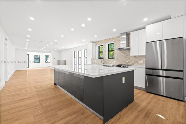 Interior, Kitchen, Recessed Lighting, Stainless Steel Appliances, Wood Texture Flooring