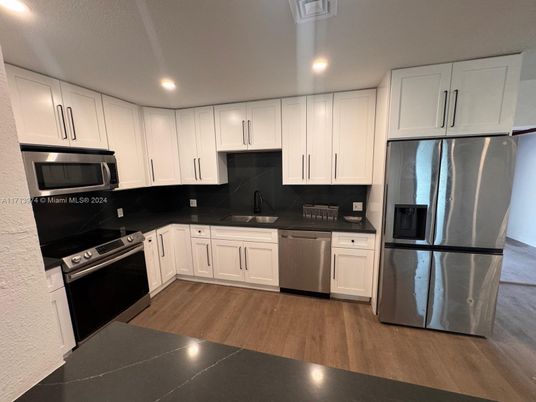 Interior, Kitchen, Recessed Lighting, Stainless Steel Appliances, Wood Texture Flooring