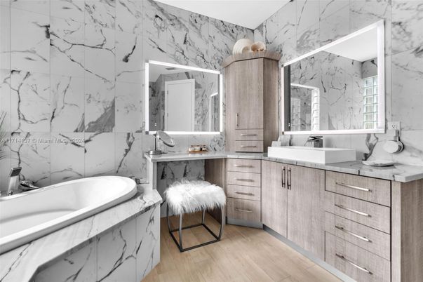 Bathroom, Dual Sink Vanities, Interior, Marble Walls, Wood Texture Flooring
