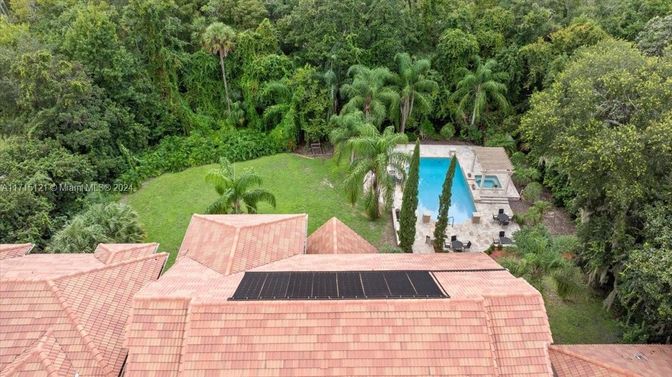 Exterior, Pool, Solar Panels