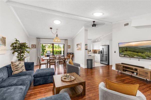 Dining room, Interior, Kitchen, Living room, Pendant Lights, Recessed Lighting, Stainless Steel Appliances, Wood Texture Flooring