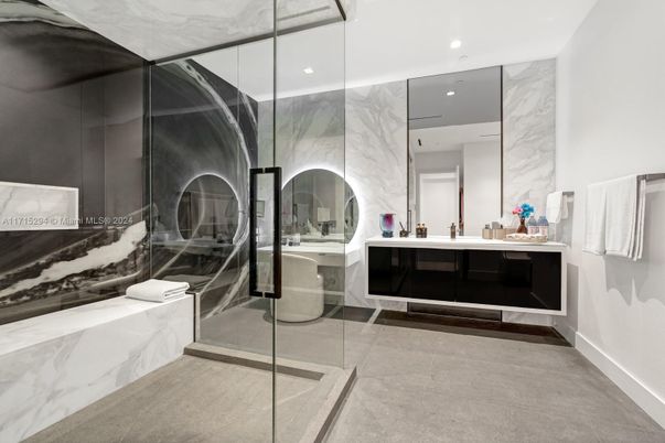 Bathroom, Dual Sink Vanities, Glass Shower, Interior, Marble Walls, Recessed Lighting