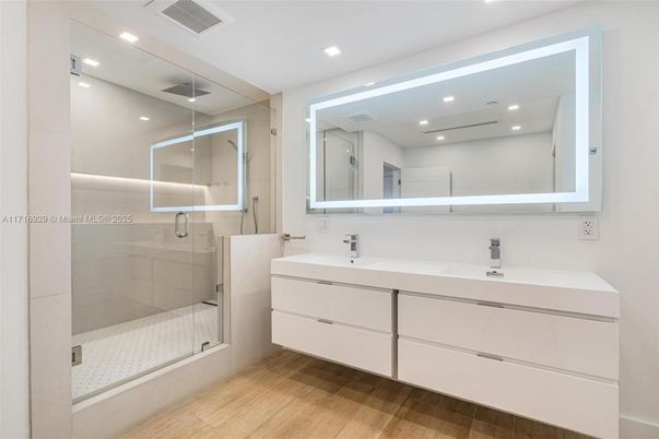 Bathroom, Dual Sink Vanities, Glass Shower, Interior, Recessed Lighting, Wood Texture Flooring