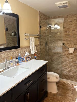 Bathroom, Dual Sink Vanities, Glass Shower, Interior, Stone Walls