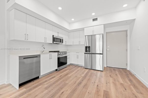 Interior, Kitchen, Recessed Lighting, Stainless Steel Appliances, Wood Texture Flooring
