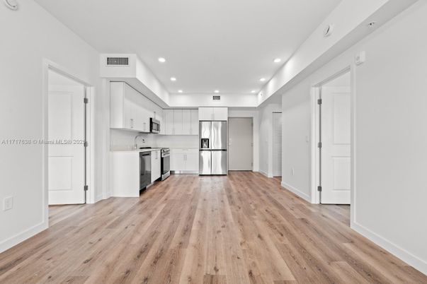 Interior, Kitchen, Recessed Lighting, Stainless Steel Appliances, Wood Texture Flooring