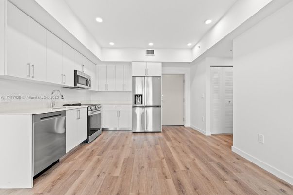Interior, Kitchen, Recessed Lighting, Stainless Steel Appliances, Wood Texture Flooring