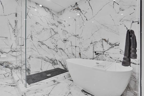 Bathroom, Free Standing Baths, Glass Shower, Interior, Marble, Marble Walls, Recessed Lighting